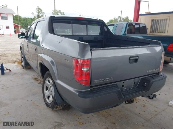 2009 Honda Ridgeline RT with VIN 2HJYK16279H501015, listed as a IAAI auction lot 41996301 with 124,716 mi miles. Bid and sale history available at carsss.com. Image 3.