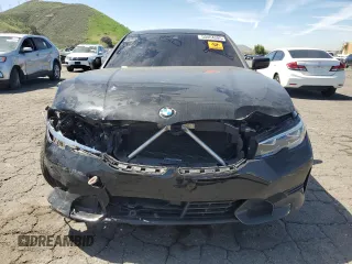 2021 BMW 3 Series 330i with VIN 3MW5R1J08M8B86329, listed as a Copart auction lot 50404285 with 33,545 mi miles and Clean Title. Bid and sale history available at carsss.com. Image 5.