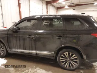 2020 Mitsubishi Outlander ES z VIN JA4AZ3A33LZ048610, wystawiony jako IAAI lot #41296277 z przebiegiem 59 372 mil mil oraz . Historia ofert i sprzedaży dostępna na DreamBid. Obrazek 14.