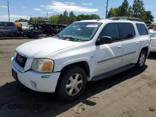 2005 GMC Envoy SLT with VIN 1GKET16M156182653, listed as a Copart auction lot 68747784 with 306,802 mi miles and Salvage Title. Bid and sale history available at DreamBid. Image 1.