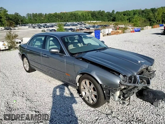2005 Jaguar XJ with VIN SAJWA79C65SG45989, listed as a Copart auction lot 65357044 with 103,587 mi miles and Salvage Title. Bid and sale history available at carsss.com. Image 10.