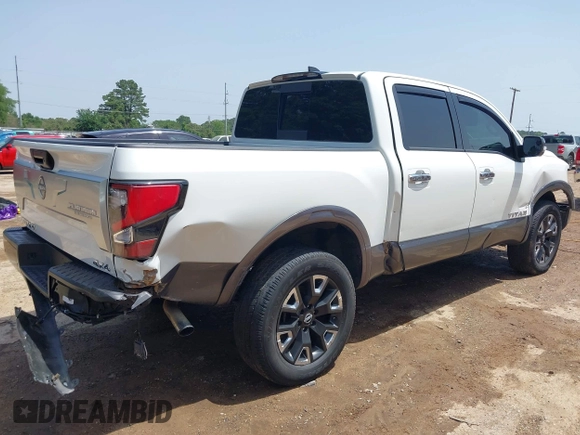 2024 Nissan Titan Pro-4X with VIN 1N6AA1ED7RN101486, listed as a IAAI auction lot 42243136 with 39,223 mi miles and . Bid and sale history available at DreamBid. Image 4.