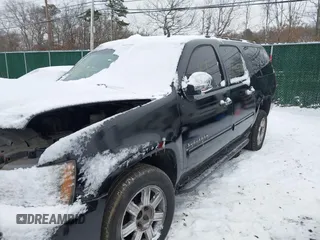 2010 Chevrolet Suburban LS with VIN 1GNUKHE37AR203811, listed as a IAAI auction lot 41304431 with Not provided miles and . Bid and sale history available at DreamBid. Image 6.