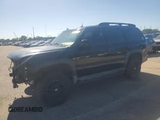2004 Chevrolet Tahoe Z71 with VIN 1GNEK13Z84R170812, listed as a Copart auction lot 55849975 with 197,459 mi miles and Salvage title. Bid and sale history available at DreamBid. Image 1.