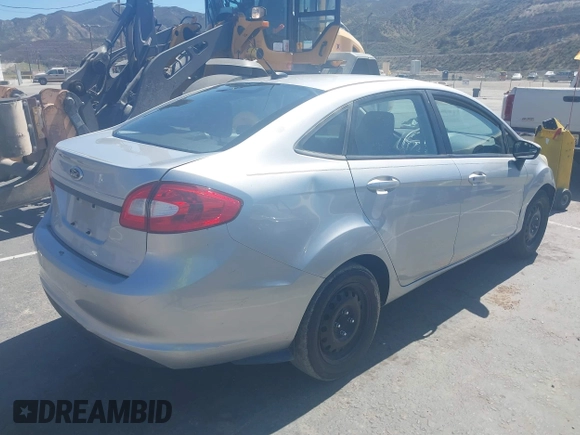 2013 Ford Fiesta S with VIN 3FADP4AJ0DM195196, listed as a IAAI auction lot 41817500 with 124,662 mi miles and . Bid and sale history available at DreamBid. Image 4.