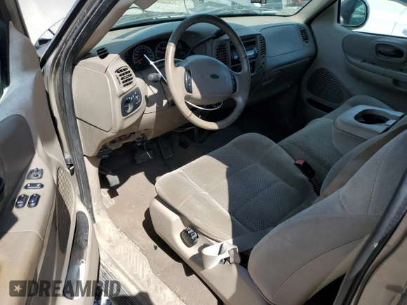 2002 Ford F-150 XL с VIN 1FTRX18L52NB25220, выставлен на аукционе Copart как лот 58202165 с пробегом 298 885 миль миль и Списание • Salvage title. История ставок и продаж доступна на DreamBid. Изображение 8.