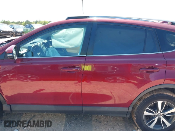 2018 Toyota RAV4 XLE with VIN 2T3WFREVXJW434957, listed as a IAAI auction lot 42002561 with 111,590 mi miles and . Bid and sale history available at carsss.com. Image 14.