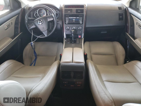 2014 Mazda CX-9 Grand Touring z VIN JM3TB2DVXE0439729, wystawiony jako Copart lot #49188875 z przebiegiem 113 839 mil mil oraz Szkoda całkowita • Salvage title. Historia ofert i sprzedaży dostępna na DreamBid. Obrazek 8.