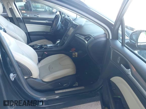 2014 Ford Fusion Titanium with VIN 3FA6P0K97ER328482, listed as a IAAI auction lot 40252350 with 137,128 mi miles. Bid and sale history available at carsss.com. Image 5.