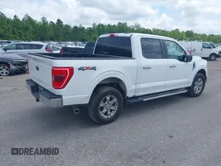2022 Ford F-150 XL with VIN 1FTFW1E52NFB50568, listed as a IAAI auction lot 42061972 with 65,065 mi miles and . Bid and sale history available at DreamBid. Image 4.