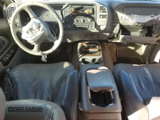 1999 GMC Denali z VIN 1GKEK13R4XR909773, wystawiony jako Copart lot #80350594 z przebiegiem 177 807 mil mil oraz Szkody całkowita. Historia ofert i sprzedaży dostępna na DreamBid. Obrazek 8.