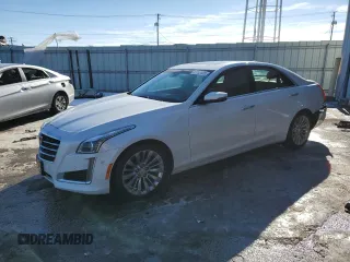 2015 Cadillac CTS Premium Collection AWD z VIN 1G6AZ5SX3F0116841, wystawiony jako Copart lot #87753425 z przebiegiem 79 330 mil mil oraz Szkoda całkowita • Salvage title. Historia ofert i sprzedaży dostępna na DreamBid. Obrazek 1.