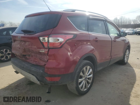 2017 Ford Escape Titanium with VIN 1FMCU0J99HUA37823, listed as a Copart auction lot 48224185 with 133,633 mi miles and Salvage Title. Bid and sale history available at DreamBid. Image 3.