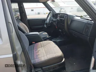2000 Jeep Cherokee with VIN 1J4FF48S5YL159414, listed as a IAAI auction lot 42416639 with 177,932 mi miles and . Bid and sale history available at DreamBid. Image 5.