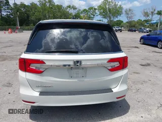 2018 Honda Odyssey EX-L z VIN 5FNRL6H76JB111027, wystawiony jako IAAI lot #42234196 z przebiegiem 88 855 mil mil oraz . Historia ofert i sprzedaży dostępna na DreamBid. Obrazek 17.