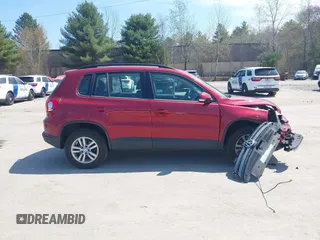 2015 Volkswagen Tiguan SE z VIN WVGBV7AX7FW056002, wystawiony jako IAAI lot #42122641 z przebiegiem 77 037 mil mil oraz . Historia ofert i sprzedaży dostępna na DreamBid. Obrazek 13.