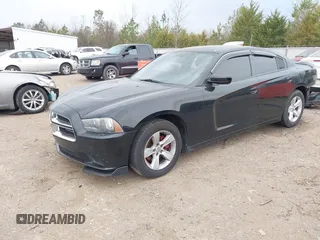 2013 Dodge Charger SE with VIN 2C3CDXBG6DH625531, listed as a IAAI auction lot 41631995 with 175,511 mi miles and . Bid and sale history available at DreamBid. Image 2.