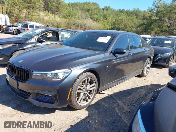 2017 BMW 7 Series 740i z VIN WBA7E2C57HG739465, wystawiony jako IAAI lot #41764778 z przebiegiem 84 814 mil mil oraz . Historia ofert i sprzedaży dostępna na DreamBid. Obrazek 2.