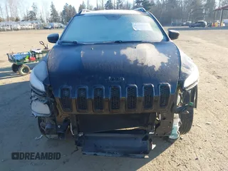2014 Jeep Cherokee Latitude with VIN 1C4PJMCS7EW286546, listed as a IAAI auction lot 41398331 with 73,650 mi miles and . Bid and sale history available at DreamBid. Image 13.