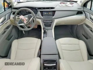 2024 Cadillac XT5 FWD Premium Luxury with VIN 1GYKNCRS9RZ706158, listed as a Copart auction lot 60455055 with 7,999 mi miles and Salvage title. Bid and sale history available at DreamBid. Image 8.