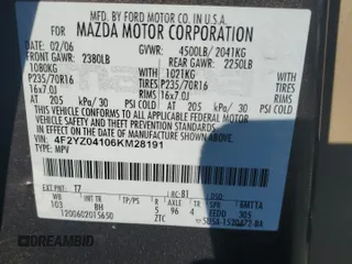 2006 Mazda Tribute S with VIN 4F2YZ04106KM28191, listed as a Copart auction lot 83150994 with 126,536 mi miles and Clean Title. Bid and sale history available at DreamBid. Image 13.
