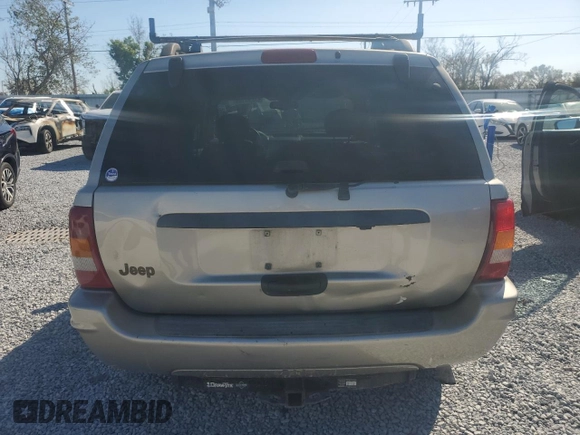 2004 Jeep Grand Cherokee with VIN 1J8GX48S84C329291, listed as a Copart auction lot 43295185 with 234,680 mi miles and Salvage title. Bid and sale history available at DreamBid. Image 6.
