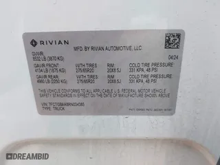 2024 Rivian R1T Adventure with VIN 7FCTGBAA8RN034385, listed as a IAAI auction lot 41302496 with 10,573 mi miles. Bid and sale history available at carsss.com. Image 9.