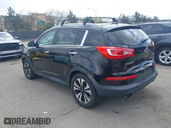 2013 Kia Sportage SX with VIN KNDPCCA61D7385219, listed as a IAAI auction lot 41945345 with 112,471 mi miles and . Bid and sale history available at carsss.com. Image 3.