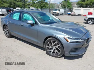 2020 Volvo S60 Momentum with VIN 7JRA22TK8LG063920, listed as a IAAI auction lot 42213044 with 74,518 mi miles and . Bid and sale history available at DreamBid. Image 1.