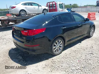 2015 Kia Optima EX z VIN 5XXGN4A76FG353935, wystawiony jako IAAI lot #42292395 z przebiegiem 161 085 mil mil oraz . Historia ofert i sprzedaży dostępna na DreamBid. Obrazek 4.