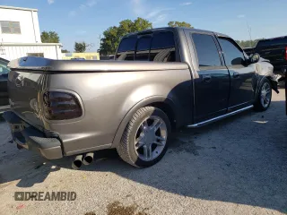 2002 Ford F-150 Harley Davidson with VIN 1FTRW07392KD46352, listed as a Copart auction lot 73463924 with 135,813 mi miles and Salvage Title. Bid and sale history available at carsss.com. Image 3.