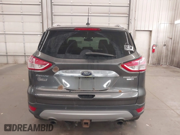 2015 Ford Escape Titanium with VIN 1FMCU9J96FUA43337, listed as a IAAI auction lot 41825328 with 149,639 mi miles and . Bid and sale history available at DreamBid. Image 17.