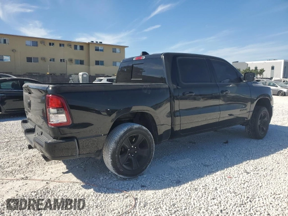 2021 Ram 1500 Lone Star with VIN 1C6RREFT2MN660620, listed as a Copart auction lot 49831035 with 49,276 mi miles and Salvage title. Bid and sale history available at DreamBid. Image 3.
