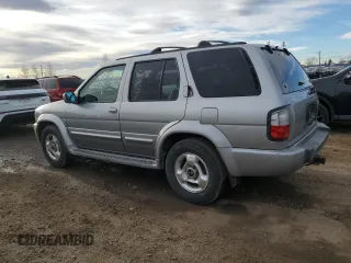 2000 Infiniti QX4 z VIN JNRAR07Y1YW083744, wystawiony jako Copart lot #80333404 z przebiegiem 191 863 mil mil oraz Czysty tytuł • Clean title. Historia ofert i sprzedaży dostępna na DreamBid. Obrazek 2.
