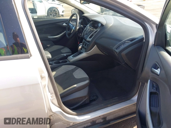 2012 Ford Focus SE z VIN 1FAHP3F28CL215997, wystawiony jako IAAI lot #42483639 z przebiegiem 101 518 mil mil oraz . Historia ofert i sprzedaży dostępna na DreamBid. Obrazek 5.