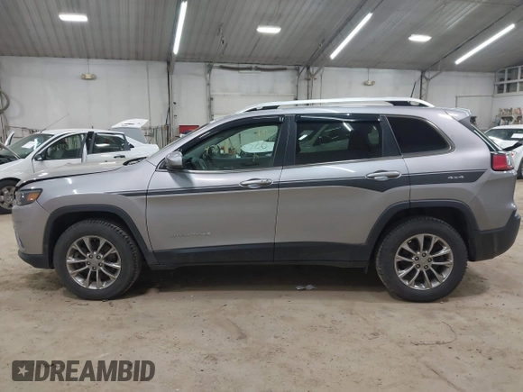 2020 Jeep Cherokee Altitude with VIN 1C4PJMLX9LD635274, listed as a IAAI auction lot 42366526 with 53,589 mi miles and . Bid and sale history available at DreamBid. Image 14.