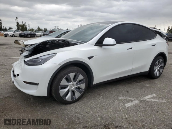 2024 Tesla Model Y Long Range with VIN 7SAYGDEE8RF088808, listed as a Copart auction lot 50406865 with 8,150 mi miles and Salvage title. Bid and sale history available at DreamBid. Image 1.