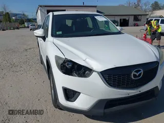 2015 Mazda CX-5 Sport with VIN JM3KE4BY3F0495511, listed as a IAAI auction lot 42170968 with 206,217 mi miles and . Bid and sale history available at carsss.com. Image 6.