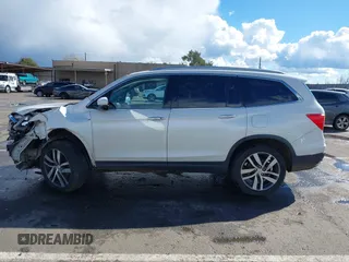 2017 Honda Pilot Elite with VIN 5FNYF6H06HB041609, listed as a IAAI auction lot 41804477 with 134,535 mi miles and . Bid and sale history available at DreamBid. Image 15.