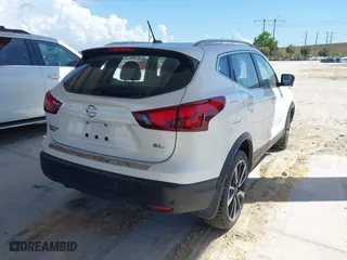 2019 Nissan Rogue Sport SV with VIN JN1BJ1CP8KW223426, listed as a IAAI auction lot 41930730 with 121,613 mi miles. Bid and sale history available at carsss.com. Image 4.