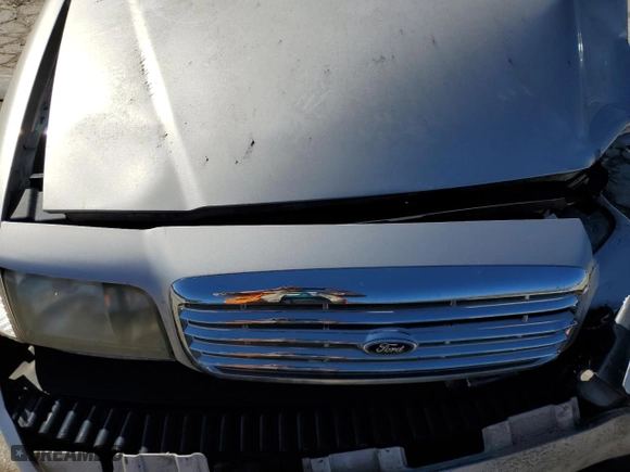 2005 Ford Crown Victoria LX with VIN 2FAFP74W85X121659, listed as a Copart auction lot 44399655 with 145,525 mi miles and Salvage Title. Bid and sale history available at carsss.com. Image 12.
