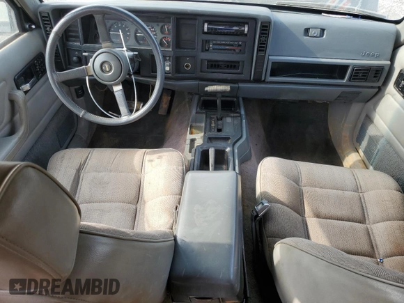 1994 Jeep Cherokee Sport with VIN 1J4FT68S0RL234669, listed as a Copart auction lot 44044555 with 282,179 mi miles and Salvage title. Bid and sale history available at DreamBid. Image 8.
