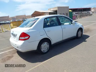 2009 Nissan Versa 1.8 S with VIN 3N1BC11E99L371998, listed as a IAAI auction lot 41723771 with 130,172 mi miles. Bid and sale history available at carsss.com. Image 4.