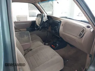 1997 Ford Ranger XLT with VIN 1FTCR10A6VUC10779, listed as a IAAI auction lot 42154779 with 155,914 mi miles and . Bid and sale history available at DreamBid. Image 5.