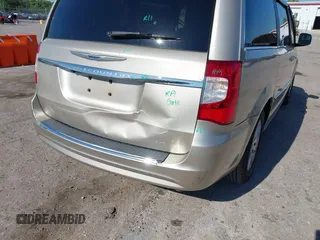 2014 Chrysler Town & Country Touring with VIN 2C4RC1BG4ER372629, listed as a IAAI auction lot 42060762 with 180,662 mi miles. Bid and sale history available at carsss.com. Image 6.