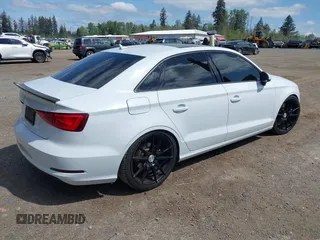 2015 Audi A3 Premium z VIN WAUACGFF5F1060291, wystawiony jako IAAI lot #42149042 z przebiegiem 74 309 mil mil oraz . Historia ofert i sprzedaży dostępna na DreamBid. Obrazek 4.