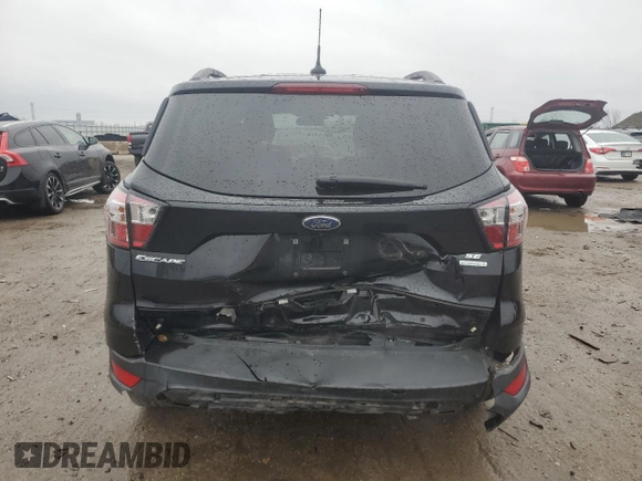 2018 Ford Escape SE with VIN 1FMCU0GD7JUB98561, listed as a Copart auction lot 85801864 with 43,348 mi miles and Salvage Title. Bid and sale history available at carsss.com. Image 6.