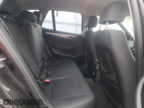 2015 BMW X1 sDrive28i with VIN WBAVM1C55FVW56937, listed as a Copart auction lot 45050785 with 77,736 mi miles and Salvage Title. Bid and sale history available at carsss.com. Image 11.
