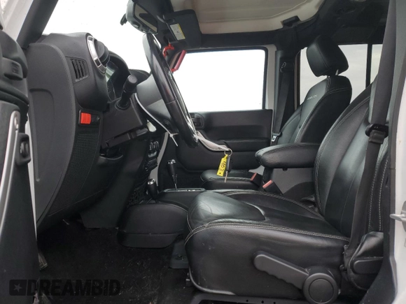 2016 Jeep Wrangler Unlimited Rubicon with VIN 1C4HJWFG9GL223928, listed as a Copart auction lot 58182125 with 57,711 mi miles and Salvage title. Bid and sale history available at DreamBid. Image 7.