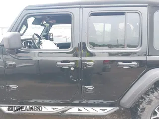 2021 Jeep Wrangler Unlimited Sport S z VIN 1C4HJXDG0MW788779, wystawiony jako IAAI lot #42137430 z przebiegiem 52 903 mil mil oraz . Historia ofert i sprzedaży dostępna na DreamBid. Obrazek 14.